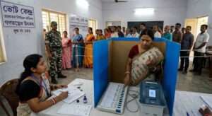 পশ্চিমবঙ্গ নির্বাচন ২০২৬: ২৩ ও ২৯ এপ্রিল দুই দফায় ভোট, ৪ মে ফলাফল - জানুন বিস্তারিত 2 https://mystate.co.in/wp-content/uploads/2026/03/the-general-election-process-in-India.jpg Indian voters casting their vote at a polling booth using EVM and VVPAT during the West Bengal Assembly Election 2026 - পশ্চিমবঙ্গ বিধানসভা নির্বাচন ২০২৬